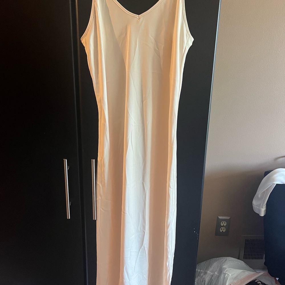 Elegant Cream Sleeveless Maxi Dress